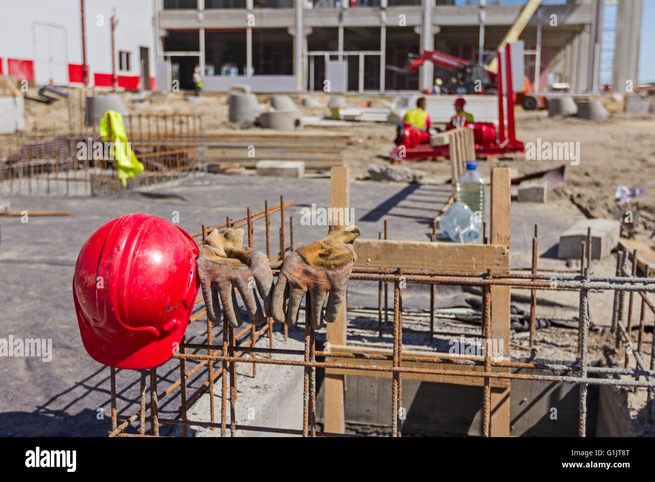 Safety equipment has been put down with construction site background Stock  Photo - Alamy